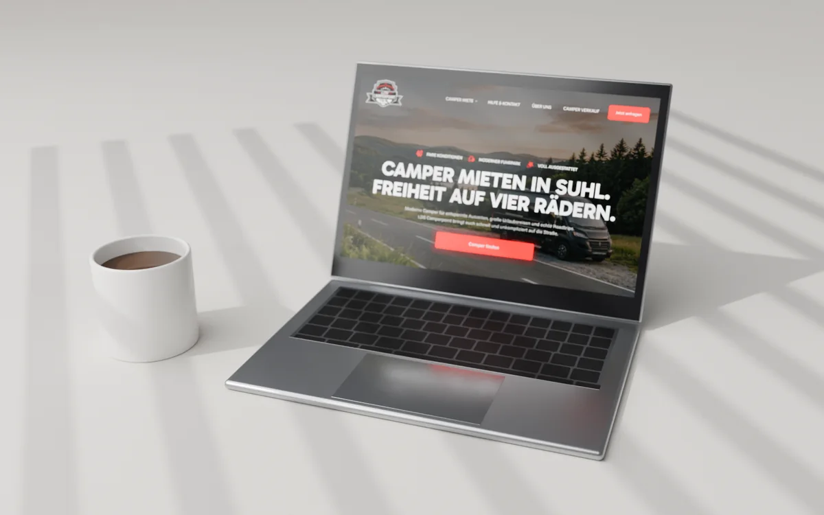 Website von LDS Camperpoint auf einem Laptop mit Kaffeetasse als Mockup